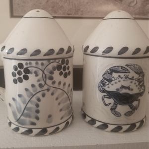 Jose Dovis salt and pepper shakers. Never used. They are blue and white.